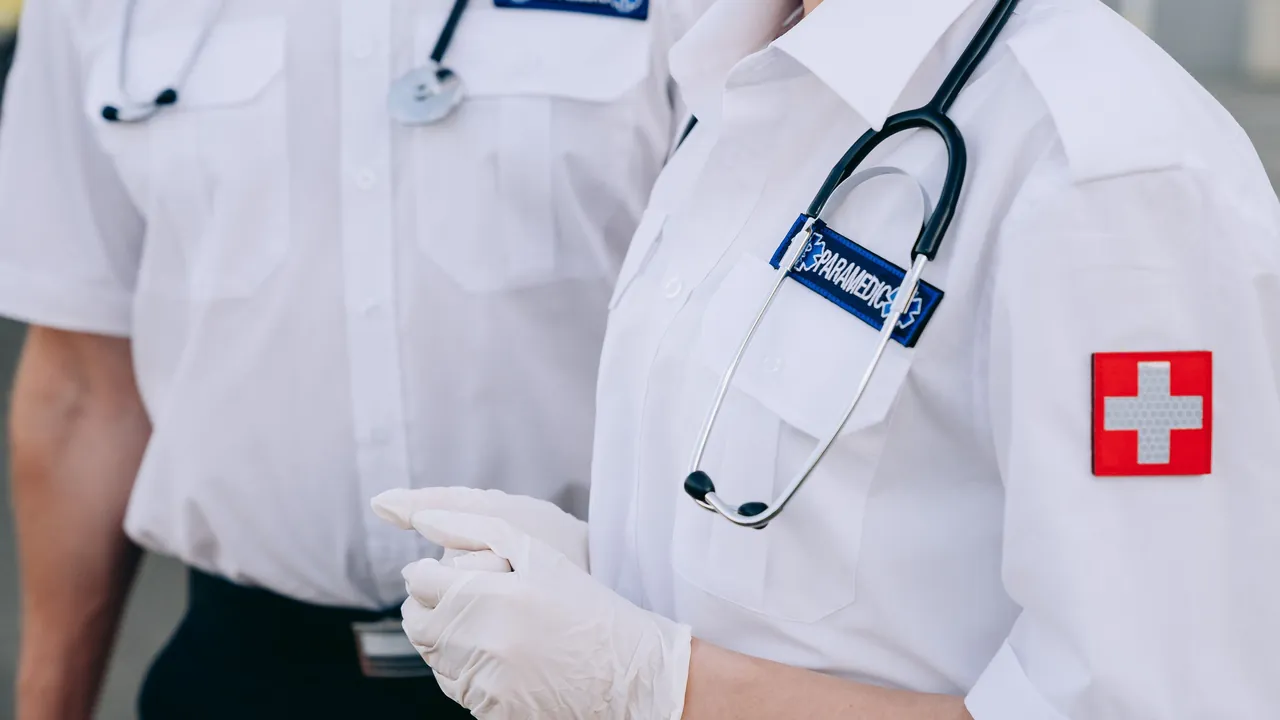 Doctors in white coats with stethoscopes