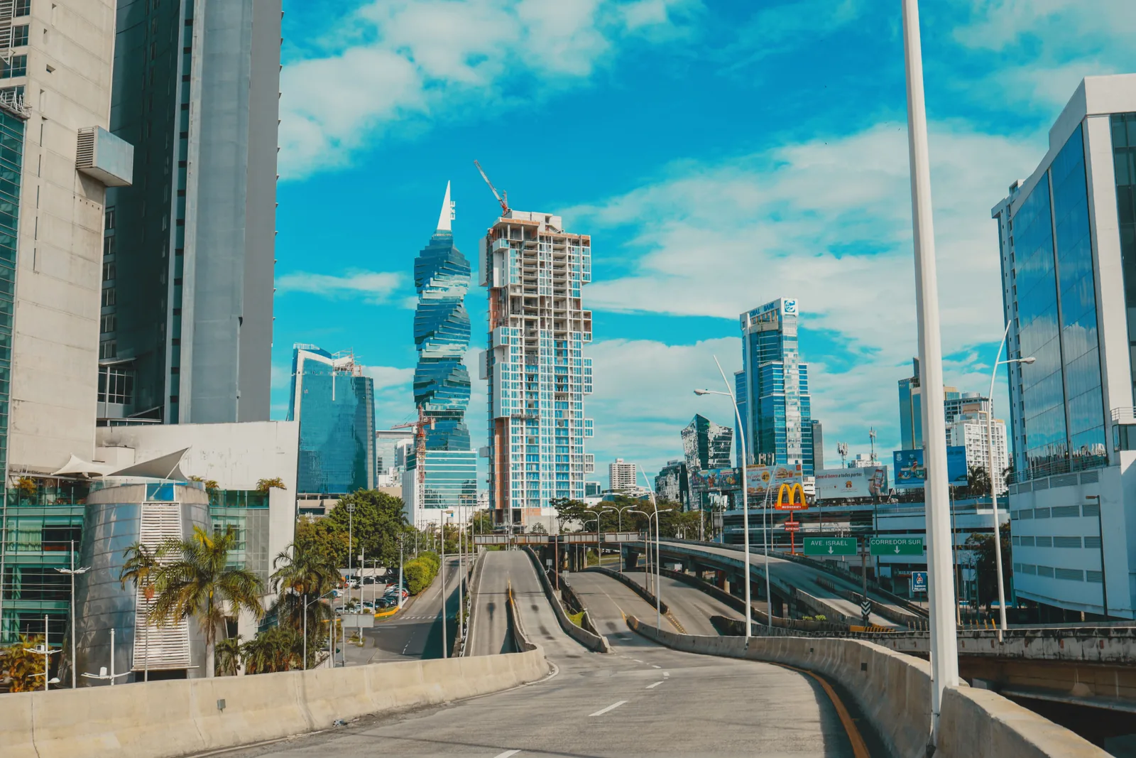 A wide avenue among the skyscrapers of Panama City